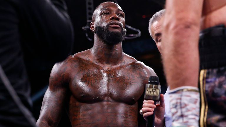 Deontay Wilder, left, prepares to fight Tyson Fury, of England, in a heavyweight championship boxing match Saturday, 