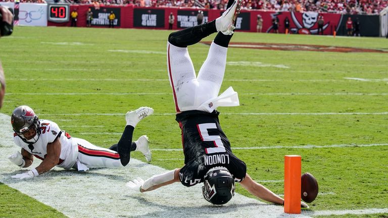 Atlanta Falcons wide receiver Drake London (5) falls after a hit by Tampa Bay Buccaneers safety Antoine Winfield Jr. (31) during the second half of an NFL football game, Sunday, Oct. 22, 2023, in Tampa, Fla. (AP Photo/Chris O'Meara)