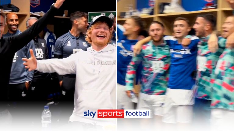 Ed Shearan celebrated in the dressing room with the Ipswich players after they beat Hull to go to the top of the Championship
