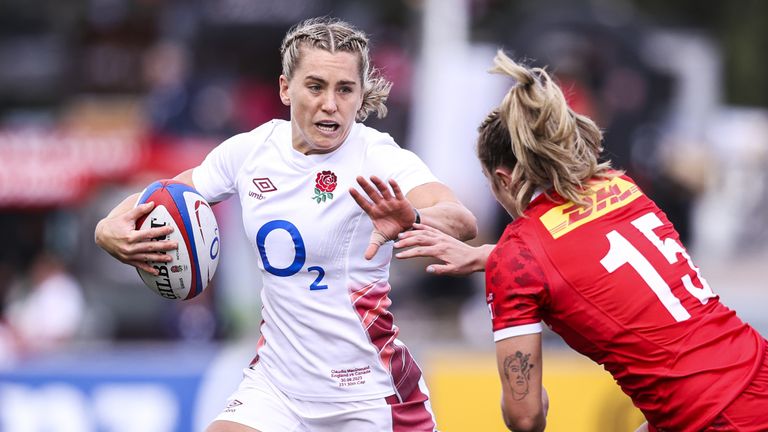 England's Claudia MacDonald (left) attempts to evade being tackled by Canada's Madison Grant during the second test match at StoneX Stadium, London.
