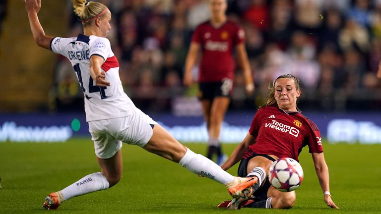Manchester United&#39;s Ella Toone and Paris Saint-Germain&#39;s Jackie Groenen battle for the ball during the UEFA Women&#39;s Champions League qualifying second round, first leg match at Leigh Sports Village