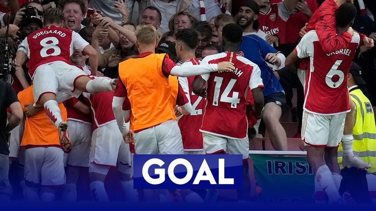 Gabriel Martinelli&#39;s deflected strike gives Arsenal a late 1-0 lead over Manchester City.