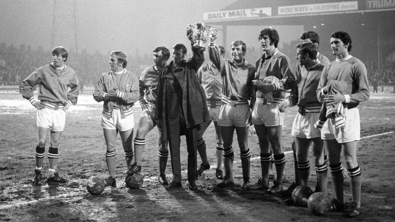 Francis Lee (2nd left) and his team-mates parade the League Cup before a first division match against Crystal Palace in 1970