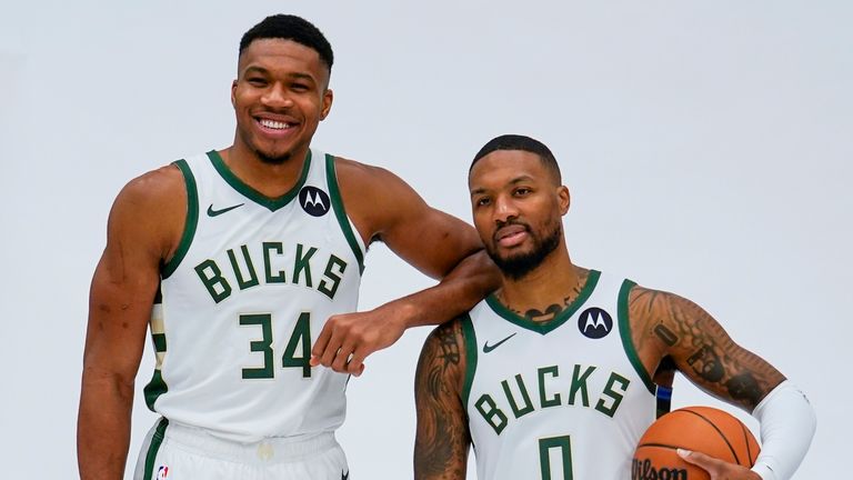 Milwaukee Bucks' Giannis Antetokounmpo and Damian Lillard pose for a picture during the NBA basketball team's media day in Milwaukee Monday, Oct. 2, 2023. (AP Photo/Morry Gash)