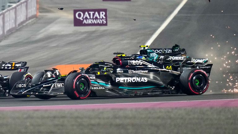 Red Bull driver Max Verstappen of the Netherlands leads at the start and followed by Mercedes driver Lewis Hamilton of Britain and Mercedes driver George Russell of Britain during the Qatar Formula One Grand Prix auto race at the Lusail International Circuit, in Lusail, Qatar, Sunday, Oct. 8, 2023. (AP Photo/Darko Bandic)