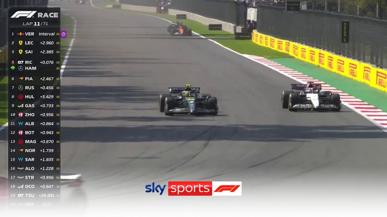 Lewis Hamilton passes Daniel Ricciardo down the main straight on the inside to move up to fourth in the Mexico City Grand Prix