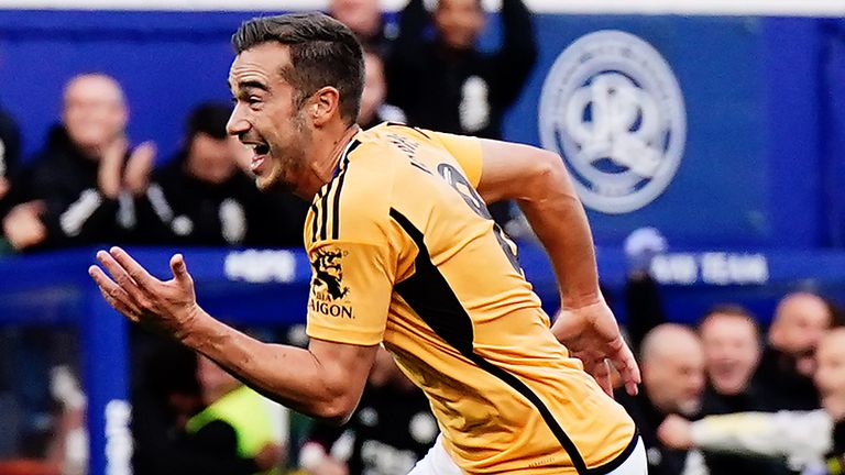 Harry Winks celebrates after scoring to give Leicester a 2-1 lead against QPR