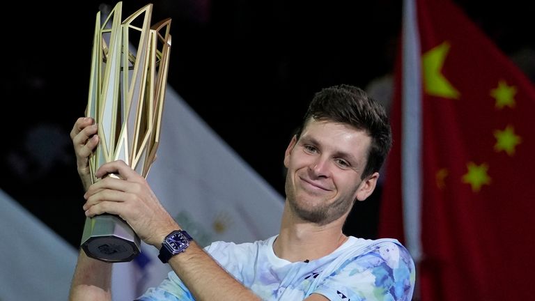 Hubert Hurkacz of Poland holds his winning trophy after defeating Andrey Rublev of Russia in the men&#39;s singles final match of the Shanghai Masters tennis tournament at Qizhong Forest Sports City Tennis Center in Shanghai, China, Sunday, Oct. 15, 2023. (AP Photo/Andy Wong)