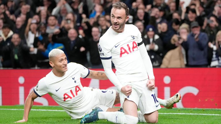 Tottenham's James Maddison and team-mate Richarlison delebrate their second goal against Fulham (AP Photo/Kin Cheung)