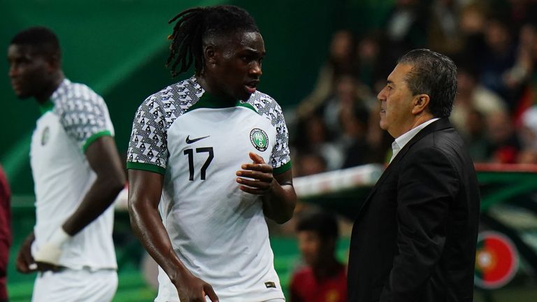 LISBON, PORTUGAL - NOVEMBER 17: Jose Peseiro of Nigeria talks with Calvin Bassey of Nigeria during the International Friendly match between Portugal and Nigeria at Estadio Jose Alvalade on November 17, 2022 in Lisbon, Portugal.  (Photo by Gualter Fatia/Getty Images)
