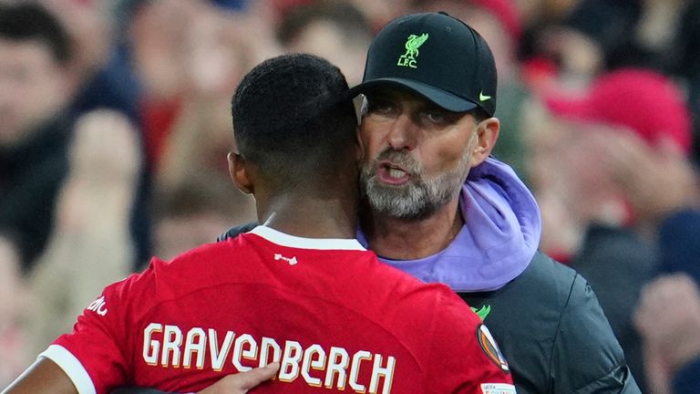 Liverpool manager Jurgen Klopp hugs Liverpool's Ryan Gravenberch (38) after he was taken out of the game during a Europa League Group E soccer match between Liverpool and Union Saint-Gilloise, Thursday, Oct. 5, 2023, at Anfield in Liverpool, England. (AP Photo/Jon Super)