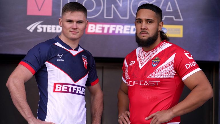 England's Jack Welsby and Tonga's Keaon Koloamatangi ahead of the first Test in St Helens on Sunday