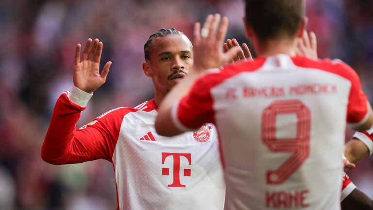 Leroy Sane is congratulated by Harry Kane