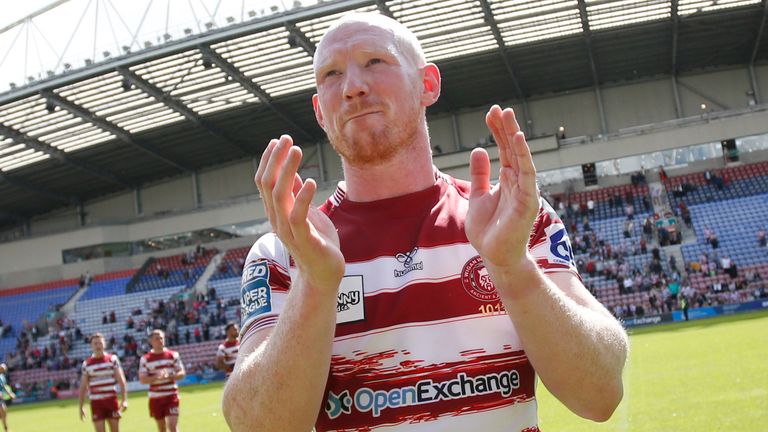 Picture by Ed Sykes/SWpix.com - 29/07/2023 - Rugby League - Betfred Super League Round 20 - Wigan Warriors v Leigh Leopards - DW Stadium, Wigan, England - Wigan Warriors' Liam Farrell applauds the fans after the game
