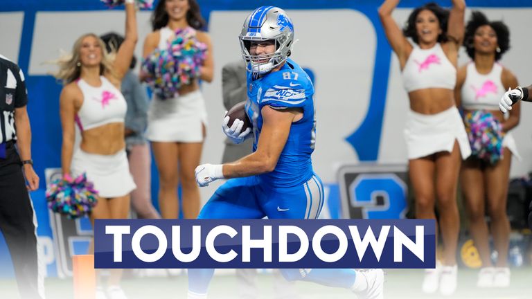 Detroit Lions tight end Sam LaPorta (87) scores a touchdown in the first half of an NFL football game against the Carolina Panthers in Detroit, Sunday, Oct. 8, 2023. (AP Photo/Carlos Osorio)


