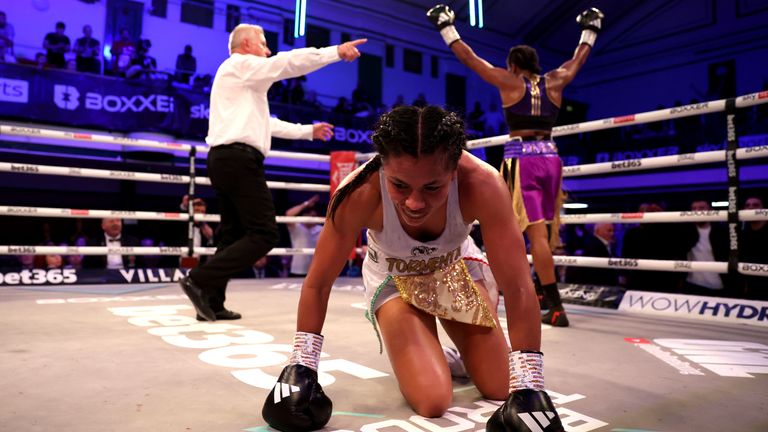 Magali Rodriguez is knocked down during the IBO Lightweight Title fight against Caroline Dubois 
