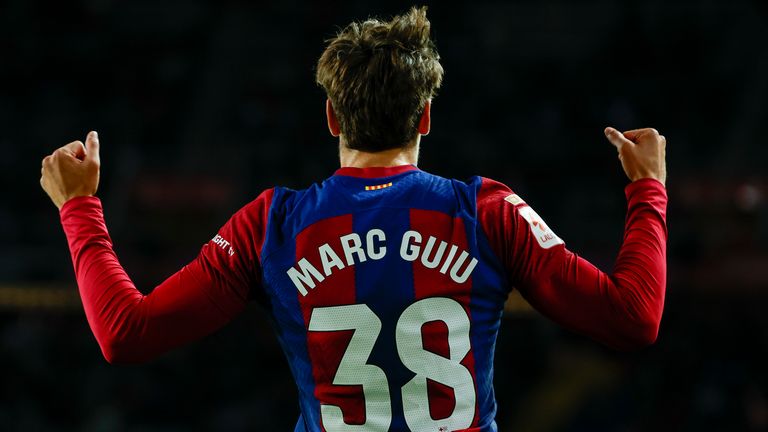 Barcelona&#39;s Marc Guiu celebrates after scoring his side&#39;s opening goal during a Spanish La Liga soccer match between Barcelona and Athletic Bilbao, at the Olympic Stadium of Montjuic in Barcelona, Spain, Sunday, Oct. 22, 2023. (AP Photo/Joan Monfort )