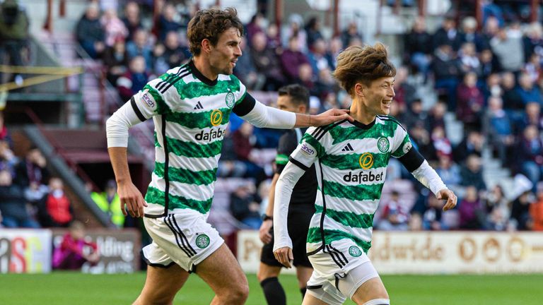 EDINBURGH, SCOTLAND - OCTOBER 22: Celtic&#39;s Kyogo Furuhashi (R) celebrates scoring to make it 3-0 with teammate Matt O&#39;Riley during a cinch Premiership match between Heart of Midlothian and Celtic at Tynecastle Stadium, on October 22, 2023, in Edinburgh, Scotland. (Photo by Mark Scates / SNS Group)