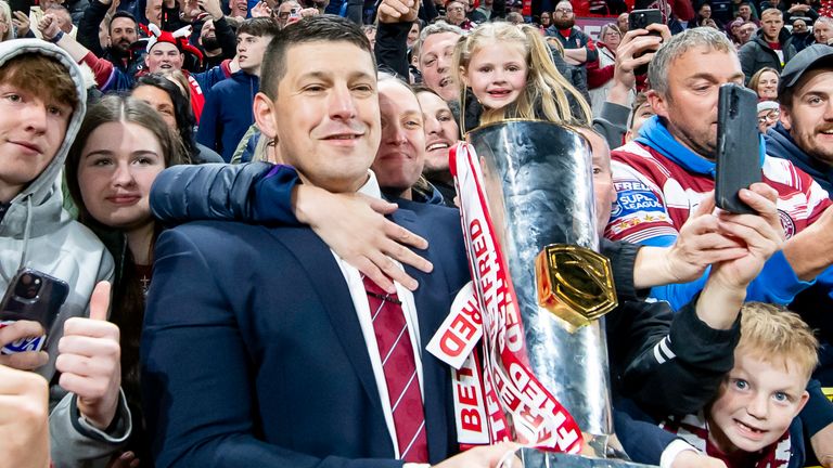 Picture by Allan McKenzie/SWpix.com - 14/10/2023 - Rugby League - Betfred Super League Grand Final - Wigan Warriors v Catalans Dragons - Old Trafford, Manchester, England - Wigan coach Matt Peet with fans and the Betfred Super League trophy.