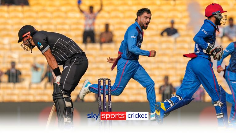 Afghanistan&#39;s Rashid Khan celebrates the wicket of New Zealand&#39;s Daryl Mitchell 