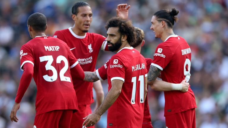 Mohamed Salah celebrates with team-mates after his equaliser