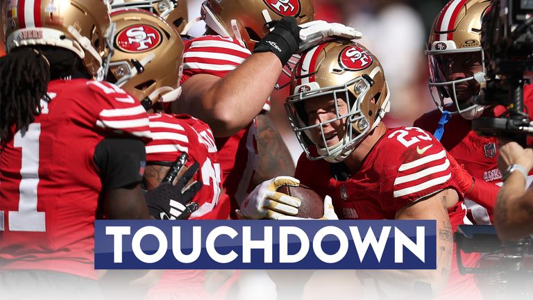 San Francisco 49ers running back Christian McCaffrey (23) is congratulated by teammates after scoring against the Cincinnati Bengals during the first half of an NFL football game in Santa Clara, Calif., Sunday, Oct. 29, 2023. (AP Photo/Jed Jacobsohn)


