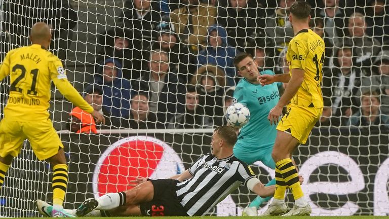 Nick Pope makes a save for Newcastle vs Borussia Dortmund