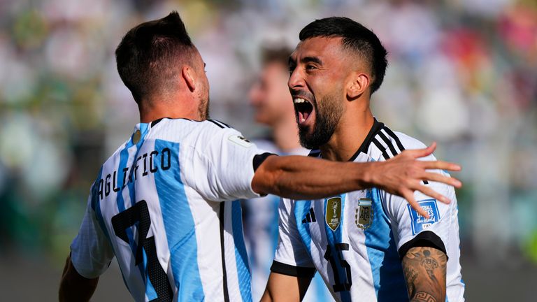 Argentina&#39;s Nicolas Tagliafico, left, celebrates with teammate Nicolas Gonzalez after scoring his side&#39;s second goal against Bolivia during a qualifying soccer match for the FIFA World Cup 2026 at the Hernando Siles stadium in La Paz, Bolivia, Tuesday, Sept. 12, 2023. (AP Photo/Juan Karita)