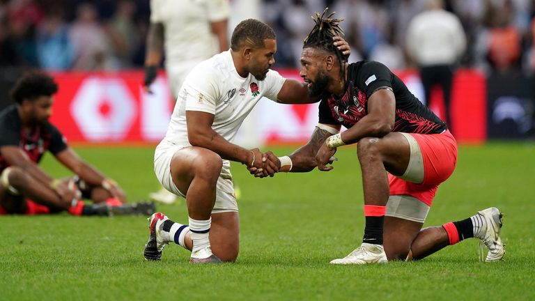 England's Ollie Lawrence consoles Fiji's Waisea Nayacalevu after the Rugby World Cup 2023 quarter-final match at the Stade Velodrome in Marseille, France. Picture date: Sunday October 15, 2023.