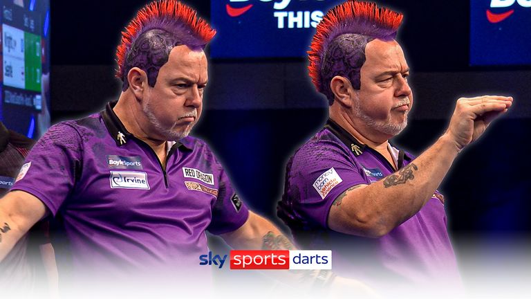 Peter Wright celebrates after two big finishes