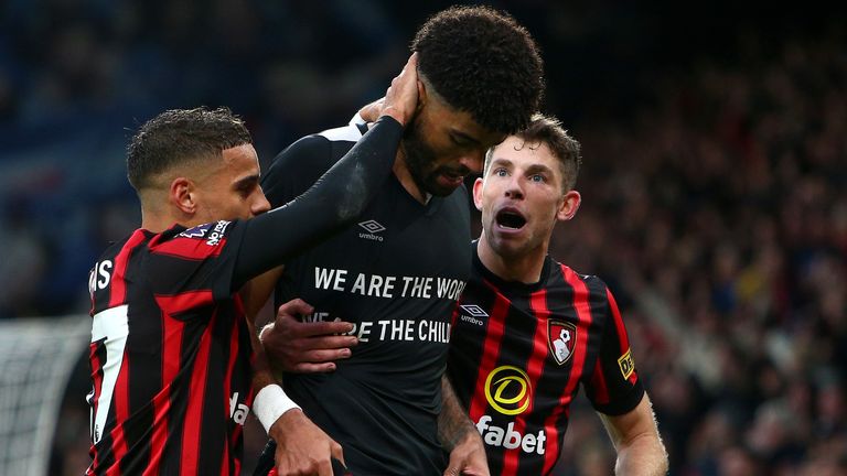 Philip Billing is mobbed by his team-mates after giving Bournemouth a 2-1 lead against Burnley