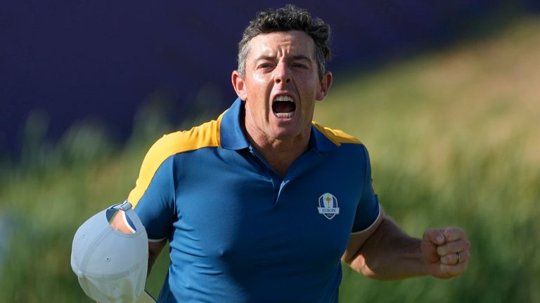 Europe's Rory McIlroy celebrates after winning his singles match against United States' Sam Burns 3&1 on the 17th green at the Ryder Cup golf tournament at the Marco Simone Golf Club in Guidonia Montecelio, Italy, Sunday, Oct. 1, 2023. (AP Photo/Gregorio Borgia)