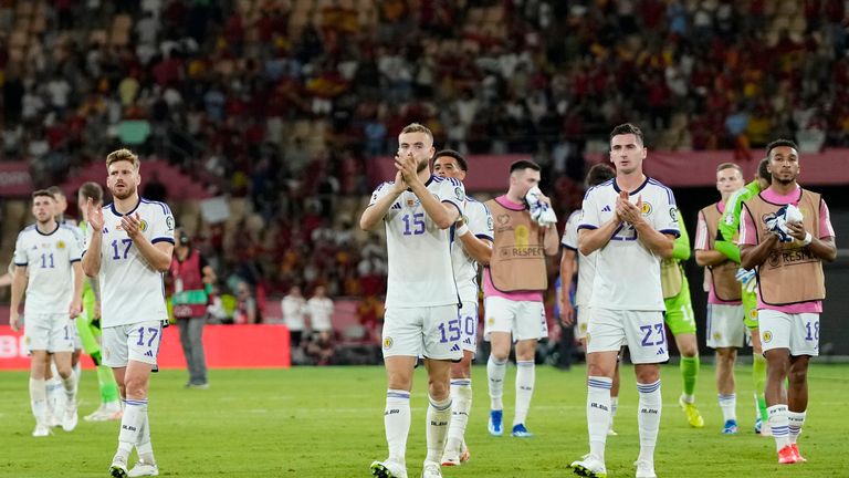 Scotland players applaud the fans at the end of the Euro 2024 group A qualifying soccer match between Spain and Scotland at La Cartuja stadium in Seville, Spain, Thursday, Oct. 12, 2023. Spain won 2-0. 