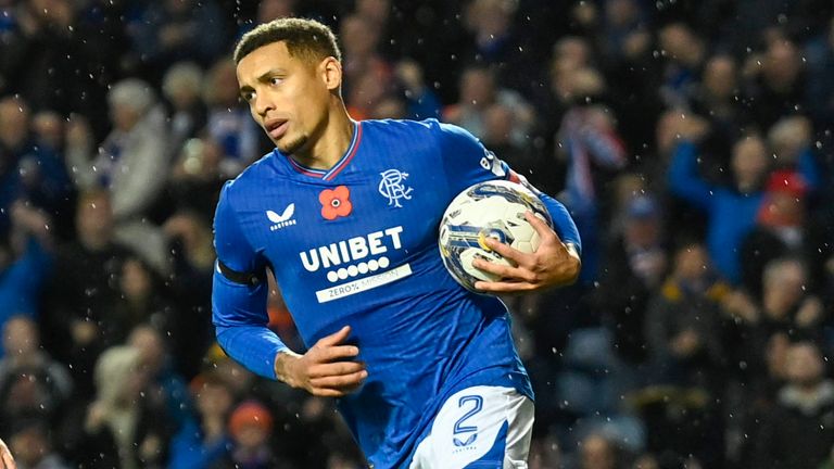 James Tavernier runs back to the halfway line after equalising for Rangers late on against Hearts