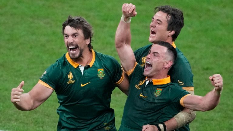 South Africa players celebrate at the end of the Rugby World Cup final match between New Zealand and South Africa at the Stade de France in Saint-Denis, near Paris Saturday, Oct. 28, 2023. (AP Photo/Themba Hadebe)