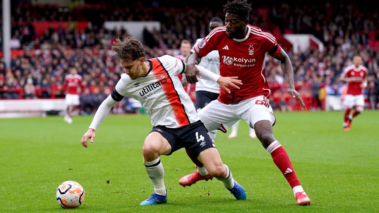 Luton Town's Tom Lockyer (left) and Nottingham Forest's Ibrahim Sangare in action