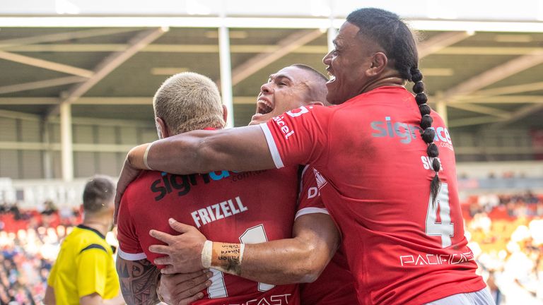 Picture by Olly Hassell/SWpix.com - 22/10/2023 - Rugby League - International Test Series - England v Tonga - The Totally Wicked Stadium, St Helens, England - Tonga...s Tyson Frizell celebrates his try with Tonga's Mosese Suli Tonga...s Tui Lolohea