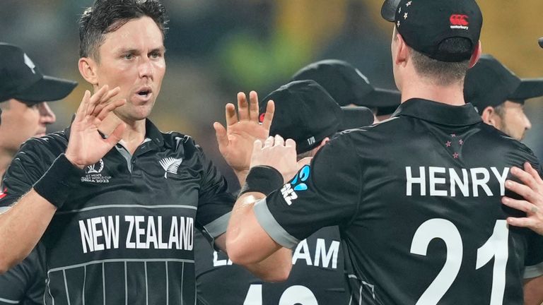 New Zealand's Trent Boult, without cap, celebrates after dismissing Afghanistan's Ibrahim Zadran during the ICC Cricket World Cup match between Afghanistan and New Zealand in Chennai, India, Wednesday, Oct. 18, 2023. (AP Photo/Eranga Jayawardena)