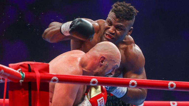 Britain&#39;s Tyson Fury (L) fights against Cameroonian-French Francis Ngannou during their heavyweight boxing match in Riyadh early on October 29, 2023. (Photo by Fayez NURELDINE / AFP) (Photo by FAYEZ NURELDINE/AFP via Getty Images)