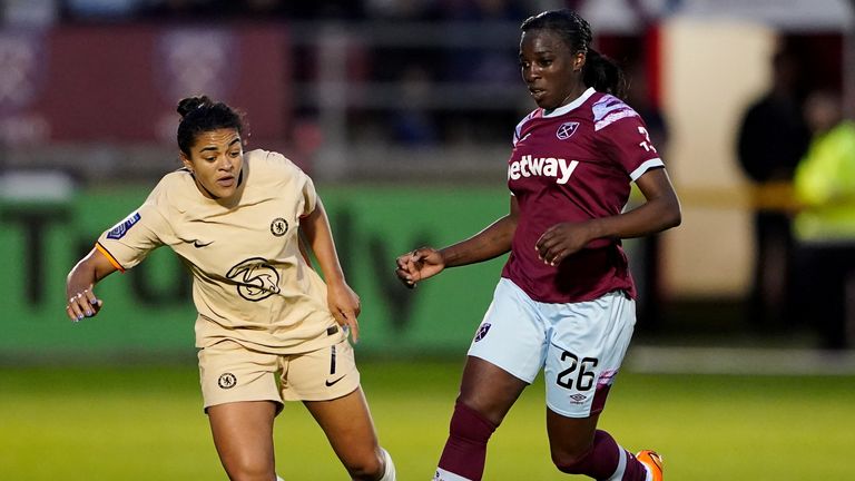 Viviane Asseyi taking on Chelsea's Jess Carter