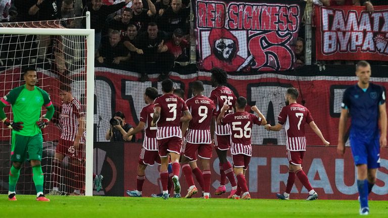 Olympiacos players celebrate their side's second goal during the Group A Europa League soccer match between Olympiacos and West Ham at Georgios Karaiskakis stadium in the port of Piraeus, near Athens, Greece, Thursday, Oct. 26, 2023. (AP Photo/Thanassis Stavrakis)