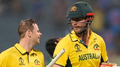 Steve Smith (left) and Mitchell Marsh (right) helped Australia ease to an eight-wicket victory over Bangladesh on Saturday