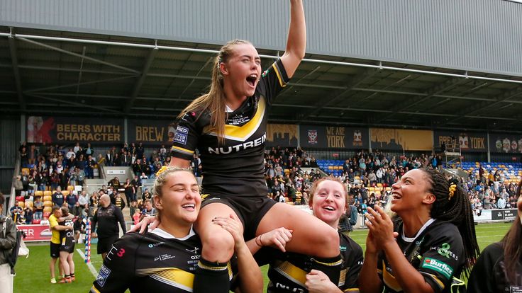 Picture by Ed Sykes/SWpix.com - 08/10/2023 - Rugby League - Betfred Women's Super League Grand Final - York Valkyrie v Leeds Rhinos - LNER Community Stadium, York, England - York Valkyrie's Lacey Owen celebrates after the game with team mates