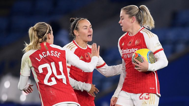 Alessia Russo celebrates with Arsenal team-mates Cloe Lacasse and Caitlin Foord after scoring against Leicester