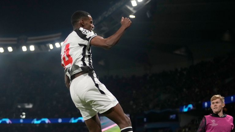 Newcastle's Alexander Isak celebrates after scoring his side's opening goal during the Champions League group F soccer match between Paris Saint-Germain and Newcastle United FC at the Parc des Princes in Paris, Tuesday, Nov. 28, 2023. (AP Photo/Thibault Camus)