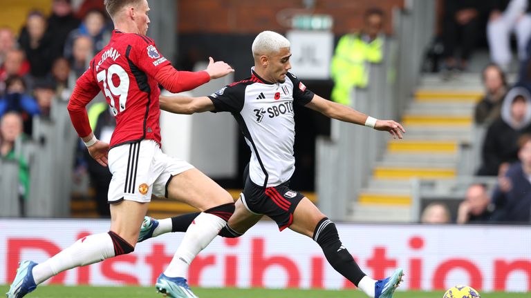 Fulham&#39;s Andreas Pereira (right) attempts a shot on goal under pressure from Scott McTominay