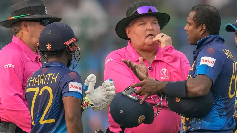 Sri Lanka&#39;s Angelo Mathews, right, talks to umpires after being timed out (Associated Press)