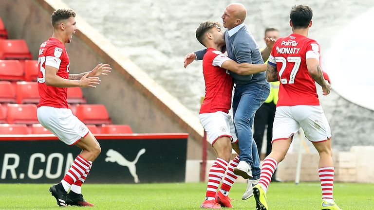 Barnsley's Patrick Schmidt (second left) celebrates scoring his sides first goal of the game with Barnsley manager Gerhard Struber during the Sky Bet Championship match at Oakwell, Barnsley. PA Photo. Issue date: Sunday July 19, 2020. See PA story SOCCER Barnsley.      
