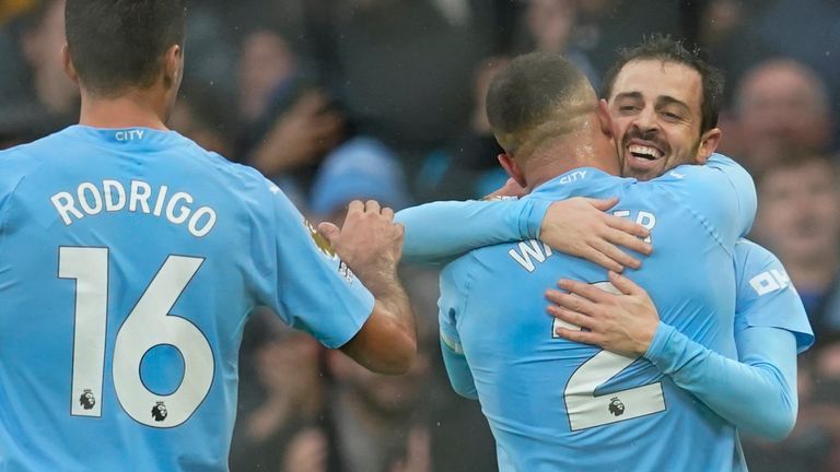 Manchester City's Bernardo Silva celebrates with team-mates after scoring their second goal