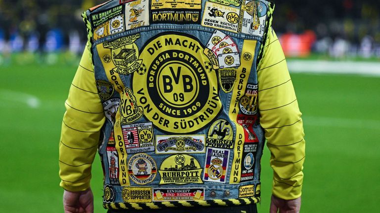 A Dortmund fan is pictured prior to the UEFA Champions League Group F football match between BVB Borussia Dortmund and Newcastle United FC in Dortmund, western Germany on November 7, 2023. (